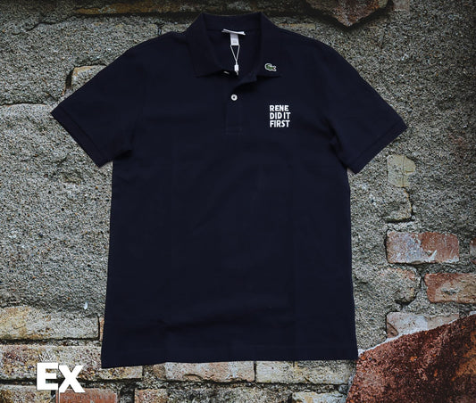 A classic black Lacoste polo shirt